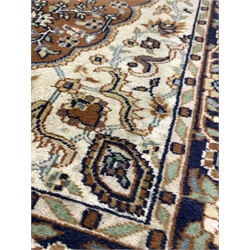 Persian design rug of blues, browns,  and greens