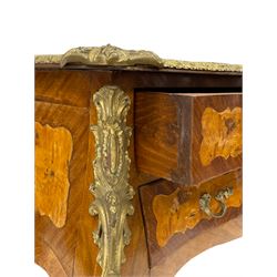 Louis VX style Kingwood and walnut bombe shaped desk, serpentine top with inset and foliate cast gilt metal edging, fitted with five drawers, decorated with scroll foliate and shell cartouche mounts, shaped figured inlaid panels
