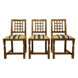 Knightman - set of six oak dining chairs, lattice back over upholstered drop-in seat, on octagonal front supports united by H-shaped stretchers, by Horace Knight, Balk, Thirsk