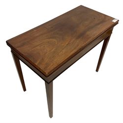 George III mahogany tea table, rectangular fold-over top with moulded edge, over single gate-leg action base, raised on square tapering supports
Provenance: From the Estate of the late Dowager Lady St Oswald