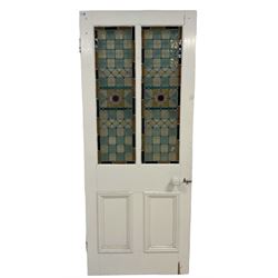 Victorian painted pine door, with leaded and stained panels centred by bullseye over two fielded panels W83cm, H204cm