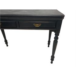 Early 20th century black and waxed finish mahogany card table, fold-over top with rounded corners revealing inset baize, fitted with two drawers, raised on turned supports