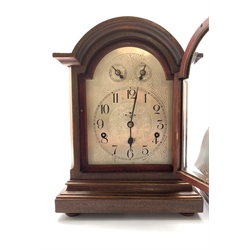 German walnut cased mantel clock by Kienzle, silvered dial with Arabic chapter ring, Westminster chiming movement with silent function, (W27cm) together with a Smiths mantel clock, (W23cm)