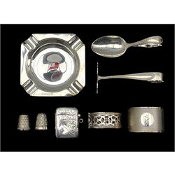Engraved silver vesta case Birmingham 1918, silver spoon and pusher, two serviette rings, ashtray and two thimbles 5oz