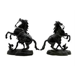 After Guillaume Coustou (1677-1746): Pair of 19th century bronzes of Marly Horses each with a groom, H28cm