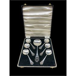Cased set of Art Deco silver comprising six dessert spoons and serving spoon with pierced finials Birmingham 1920 Maker Lanson Ltd  7oz