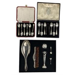 Set of six late Victorian silver teaspoons and tongs with engraved stems London 1894 Maker Josiah Williams & Co, set of six silver coffee spoons, cased, silver trumpet shape vase, silver backed brush and comb, pair of salt spoons and serviette ring 