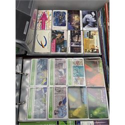 Collection of British Telephone Cards in two albums, The Standard Catalogue of UK Telephone Cards, Goldeneye set, Telecard magazines etc in one box