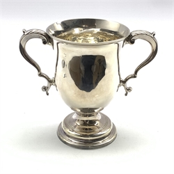 George III silver two handled loving cup of baluster form with leaf capped scroll handles and pedestal foot H14cm London 1817 Maker possibly John Scofield 10.9oz