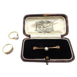 Early 20th century rose gold single pearl ring, gold pearl bar brooch, and three row ruby and pearl ring all 15ct stamped or hallmarked