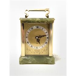 An 'Elliott' early 20th century brass and onyx carriage time piece clock, engraved brass dial with silvered Roman chapter ring, W13cm