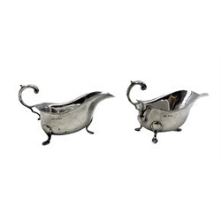 Pair of Georgian design silver sauce boats with 'C' scroll handles and shaped supports Birmingham 1964  Maker Hampton Utilities  13.8oz