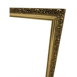 Large rectangular wall mirror with foliate patterned gilt frame and bevelled plate; with matching smaller mirror 