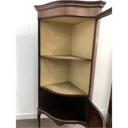 Edwardian mahogany serpentine display cabinet, the dentil cornice with satin and box wood inlay surmounting single glazed door revealing two shelves over shaped apron, terminating in three cabriole supports W72cm, H158cm, D45cm 