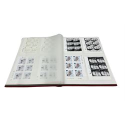 Queen Elizabeth II mint decimal stamps, housed in a stockbook, face value of usable postage approximately 210 GBP