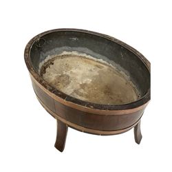 Brass bound bucket jardinière, with metal lining, raised on four splayed supports W62cm