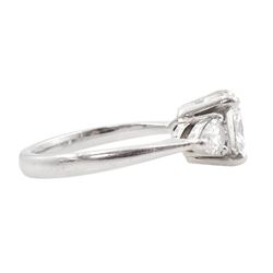 Platinum three stone diamond ring, the central cushion cut diamond of 2.01 carat, G colour, SI1 clarity, with a pear cut diamond set either side of 0.30 carat each, G colour, VS2 clarity, Edinburgh 2021, total diamond weight 2.61 carat, each diamond with GIA certificate