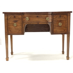 George IV mahogany break bow front sideboard, with ebonised string inlay, two drawers and a cupboard, raised on square tapered supports with spade feet