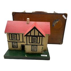 Wooden suitcase and a dolls house