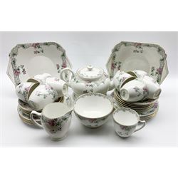 Shelley Bramble Rose pattern tea set comprising nine cups and saucers, nine plates, tea pot and stand, milk jug, sugar bowl and two bread and butter plates pattern No. B293