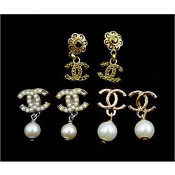 Three pairs of Chanel 'CC' pendant stud earrings, two with faux pearls, one stamped 06 V, the other gilt crystal pair stamped 06 A 