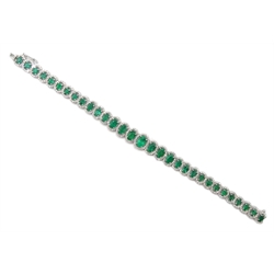 18ct gold graduating oval emerald bracelet, each emerald surrounded by brilliant cut diamonds, total emerald weight 7.59 carat, diamond total weight 2.67 carat 