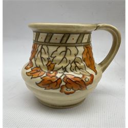 Crown Ducal Charlotte Rhead jug decorated in the Ankora pattern no. 5983 with graduated handle H22cm, Circular Fruits pattern no. 5982 jug and fruit bowl together with a small jug in the Golden Leaves no.4921 (4)