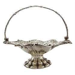 Victorian silver fruit basket with embossed and pierced decoration, swing handle and pedestal foot D26cm Sheffield 1840 Maker Henry Wilkinson & Co  21.1oz