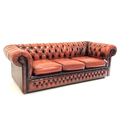 Late 20th century three seat chesterfield sofa upholstered in deeply buttoned red leather, W197cm