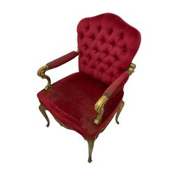 Pair mid-to late 20th century gilt metal elbow chairs, foliate scroll cast frame decorated with shells, upholstered in buttoned red fabric, on cabriole supports