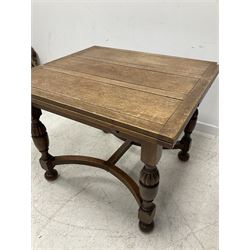Early 20th century oak drawer leaf dining table,  raised on turned supports together with six chairs