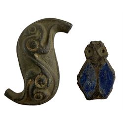 Roman British or Iron age copper alloy Dragonesque brooch, the concave s-shaped plate decorated with intricate curved and spiral design with pellets L5cm; Roman copper alloy and enamel fly brooch, lozenge plate with two blue enamel wings and drilled eye holes L3cm, both circa 1-260 AD (2)
