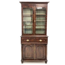 Georgian mahogany secretaire bookcase, glazed doors enclosing three adjustable shelves, fall front drawer under fitted with birds eye maple drawers and an inset tooled skiver, cupboard under enclosing shelf and flanked by turned pilasters, raised on turned supports, W92cm, H207cm, D42cm