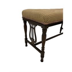 Regency design walnut piano duet stool, seat upholstered in buttoned patterned fabric, lyre end supports flanked by gadroon and turned uprights united by H stretcher