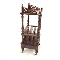 Victorian mahogany Canterbury whatnot, half galleried pierced top raised on turned supports over two division magazine rack,  one drawer under, raised on ceramic castors, W61cm, H109cm, D39cm