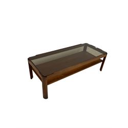 Myer - Mid century teak coffee table, the smoked glass top over shelf, raised on rounded supports 