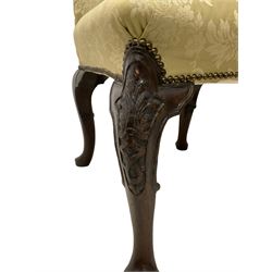 18th century and later walnut side chair, rectangular back over overstuffed seat upholstered in pale celadon damask fabric with stud work, scroll carved cabriole supports decorated with leaf carved panels and intertwined strapwork on pad feet 
Provenance: From the Estate of the late Dowager Lady St Oswald