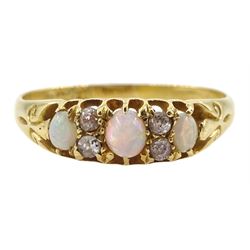 Victorian 18ct gold three stone opal ring, with four diamond accents set between, Birmingham 1896