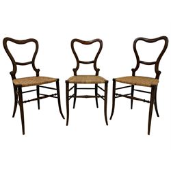 Set three Victorian chairs, simulate rosewood on beech frames with cane work seat in star pattern, on tapering splayed supports joined by turned stretchers 