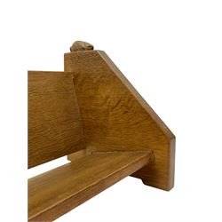Rabbitman - oak book trough, triangular end supports, carved with rabbit signature, by Peter Heap, Wetwang 