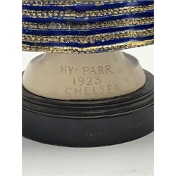 Harry Parr (1882-1966):  Chelsea pottery figure of an elegant lady in a blue dress holding a rose inscribed 'Hy. Parr, Chelsea 1923' on a circular wooden base H28cm (restored)