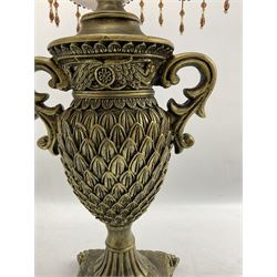 Pair bronzed amphora lamps with pineapple decoration, scroll handles and foliate base with scrolled feet together with pair peach ground shades and raised floral pattern H76cm (2)