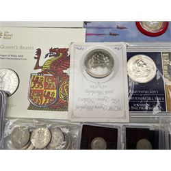 Coins including United Kingdom 1994 brilliant uncirculated coin collection, 2001 silver proof five pound coin, 2017 silver proof one pound, the Red Dragon of Wales 2018 brilliant uncirculated five pounds, 100th Anniversary of the First World War Armistice 2018 brilliant uncirculated two pound coin, 2018 Centenary of Royal Air Force silver proof coin cover, 2018 Royal Mail Centenary of World War One silver proof coin cover, 2018 one ounce fine silver Britannia, brilliant uncirculated fifty pence coins, commemorative crowns etc, please note that the majority of the items/coins in this lot have damage or alteration far beyond the normal handling or light wear that would be expected, including but not limited to tape residue on coins and paper covers, permanent marker writing on covers or packs, heavily broken packaging etc, in one box