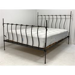 Wrought metal 5' double bed, with slatted base and mattress, together with eight wrought metal rods of a similar design 
