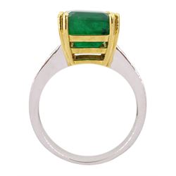18ct white and yellow gold single stone emerald ring, with channel set baguette diamond shoulders, stamped 750, emerald 4.83 carat, total diamond weight 0.60 carat