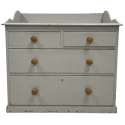 Painted pine chest of drawers, the raised back over two short and two long drawers, raised on a plinth base 