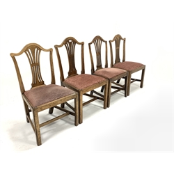 Matched set of four early 19th century oak dining chairs, pierced splats, upholstered drop in seat pads, raised on square supports, 