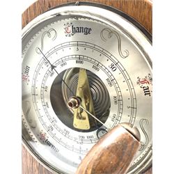 Nautical themed table top lamp and aneroid barometer, the oak case with novelty ships wheel and gas lamp, W42cm