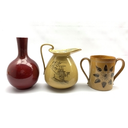 19th century Doulton Lambeth salt glaze twin-handled loving cup H19cm, Bernard Moore flambe bottle vase and a Royal Doulton 'Night Watchman' pattern jug (all a/f)