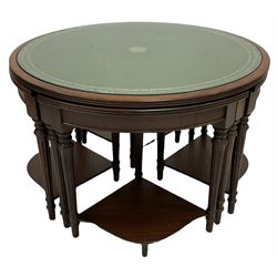Nest of five mahogany tables, the inset and tooled top over reeded edge, raised on turned and reeded supports 